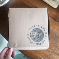 to-go box at Rise Authentic Baking Co in Grand Rapids