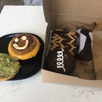 Breakfast sammie and box of baked goodies  at Rise Authentic Baking Co in Grand Rapids