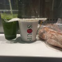 Vegetable juice, veg soup, and a baguette from a nearby stall to make a full meal at Vegeteria Juice - Shinjuku Station in Tokyo