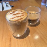 Oat milk cappuccino and doppio espresso  at Cafe Du Soleil in Vancouver