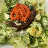 Spicy jalapeño black bean burger salad style   at Raw in Milpitas