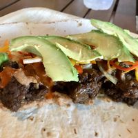 Fajita burrito. Served unwrapped.  at Magic Vegan Cafe in Gulfport