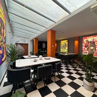 The Sanctuary dining room at the rear  at Genesis Plant Based Alchemy in North London