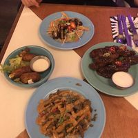 Clockwise - hoisin taco, Korean bbq wings, Cajun kebab taco, cheese sticks  at Genesis Plant Based Alchemy in North London