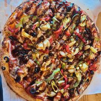 Build your own pizza, the soy chorizo is very good (apparently only available at some locations) at Blaze Pizza - Sunridge Mall in Calgary