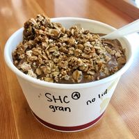 Super hero chocolate almond milk with granola  at Choice Superfood Bar & Juicery - Little Italy in San Diego