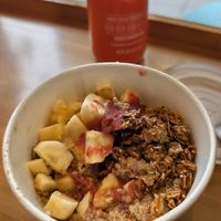 Buddha breakfast bowl, has warm quinoa topped with granola & bananas. Very tasty at Choice Superfood Bar & Juicery - Little Italy in San Diego