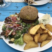 Weed burger with patato’s at Basic Beach Bar De Branding in Renesse