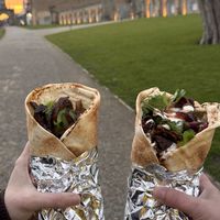 Eating our food in the castle grounds    at Sun of Seitan in Newcastle Upon Tyne