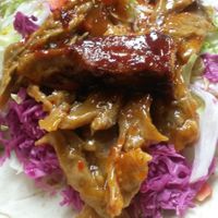 Fabulous buffalo wings in flat bread with salad at Sun of Seitan in Newcastle Upon Tyne