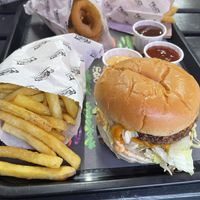 Scorpion burger, fries and onion rings  at Frost Burgers in Liverpool