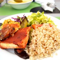 Polenta with mushrooms, tofu with beet sauce, steamed vegetables (eggplant, green pepper and zucchini), brown rice, purple cabbage, leek and tomato at Green Pepper in Lisbon
