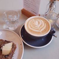 Oat latte and banana bread with nuts! at Cafe Nomad - Weststadt in Heidelberg