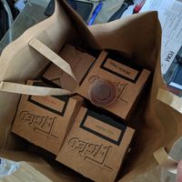 The boxes of deliciousness (plastic tub of BBQ sauce on the top, the rest came in cardboard!) at Twisted London in East London