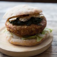 FRANCE Burger! Traditional plain omelette made from free range eggs, potatoes and onions sourced from local farmers, all served inside fresh, crusty ciabatta bread with lettuce, tomato, gherkins , SPINACH cooked in honey, BLUE CHEESE and house sauces (salsa brava and alioli at Capitan Veggie in East London