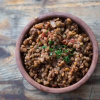 SPANISH LENTILS! Spanish lentils slow cooked in tomatoes sauce, carrots and onions served with one guindilla on top. Like my mum was preparing always for me, now for you! at Capitan Veggie in East London