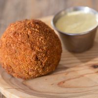 Homemade ARANCINI PAELLA! Stuffed Paella balls filled with a heart of ARTICHOKE which are coated with bread crumbs and then deep fried. So Yummy!
 at Capitan Veggie in East London