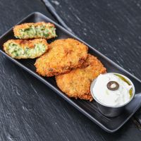 Courgette balls with manchego served with a fresh homemade Tzatziki sauce at Capitan Veggie in East London