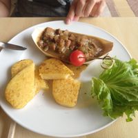 Polenta with Seitan a la veneciana at Isola Smeraldo in Lignano Sabbiadoro