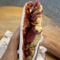 New flavor. Hummus, red onions, sundried tomatoes and rúcula .  at Tapi Tapioca - Loja Leblon in Rio De Janeiro