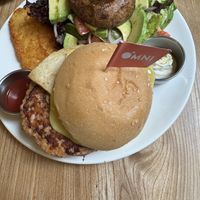Vegan Omni Pork Burger combo (with salad and hash brown )  at Puffin Cafe in Macau