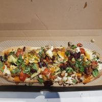 As many toppings as you want, all one price at &pizza in Baltimore