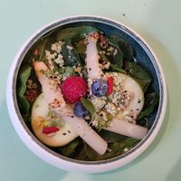 White asparagus salad with young spinach shoots, yellow beet, mustard vinaigrette at Imagine Café in Paris