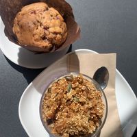 Rasberry muffin and youghurt with granola  at Be Kind Cafe in Geneva