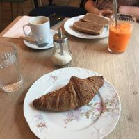 Breakfast croissant and tartines at Be Kind Cafe in Geneva