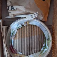 Home delivered bowl with pita at CAVA - Congress Ave in Austin