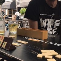 Vegan iced coffee, playing games on  terrace  at Locals in Tilburg