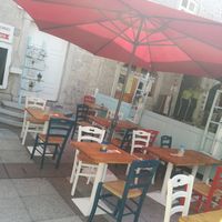 Cozy seating spot on the main plaza at Konoba Andreja in Krk