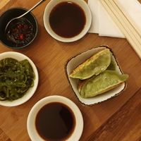 Grilled gyoza, algae salad and sauces at Chez Ann in Paris