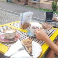 Oat milk cappuccino, "Kinduccino"(kids cappuccino), ice cream and blueberry poppy crumble cake at Brettle in Ulm