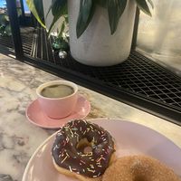 Choc sprinkles, Cinnamon Sugar & an Americano  at Brammibal's Donuts - Potsdamer Platz in Berlin