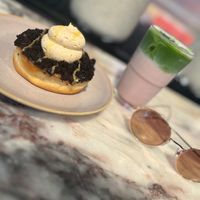 Small strawberry matcha latte and donut at Brammibal's Donuts - Potsdamer Platz in Berlin