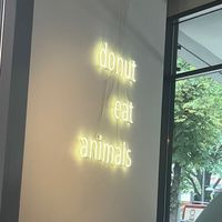 “Donut eat animals” quote on wall at Brammibal's Donuts - Potsdamer Platz in Berlin