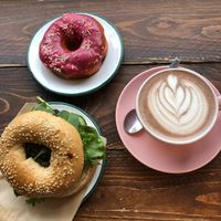 Hummus and pesto bagel, hibiscus donut and hot chocolate  at Brammibal's Donuts - Potsdamer Platz in Berlin
