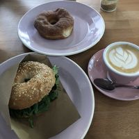 Bagel sandwich, cinnamon sugar donut and of course, cappuccino! at Brammibal's Donuts - Potsdamer Platz in Berlin