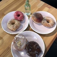 Boston cream, earl grey lemon, hibiscus, salted caramel, gin and vodka, strawberry jam! at Brammibal's Donuts - Potsdamer Platz in Berlin