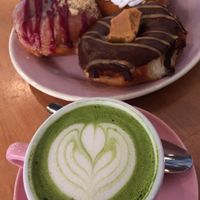 Matcha latte with blueberry, peaches and cream and peanut butter fudge donuts  at Brammibal's Donuts - Potsdamer Platz in Berlin