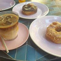 Iced latte, salted caramel hazelnut donut and chocolate and peanut butter donut at Brammibal's Donuts - Potsdamer Platz in Berlin
