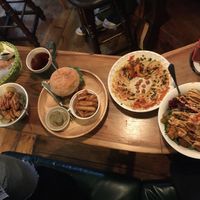 Christmas Falafel feast! Salad with minestrone soup, Hummus plate, Falafel burger with fries and karage “fried chicken”.  at Falafel Brothers - Ebisu in Tokyo