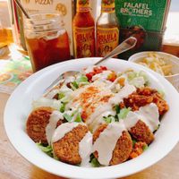 I had a falafel salad which contains super crispy falafels and you can choose 3 pickles. at Falafel Brothers - Ebisu in Tokyo