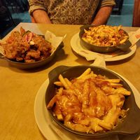 Wings, teddy bear fries and cheese and gravy fries. at Tiny Rebel in Cardiff