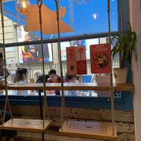 There are swings inside 💕 at Island Poke - Soho in London