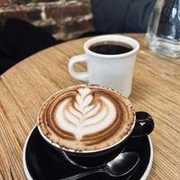 Moka with oat milk and black filter coffee.  at Grounded in Paris