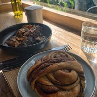 Breakfast toast and cinnamon roll at Grounded in Paris