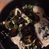 Brussels sprouts with vegan sauce, minus a few bites at Mangalitsa in Woodstock