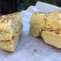 Everything bagel with hummus, artichoke hearts, and red onion  at Biff's Bagels in Flagstaff